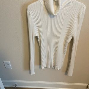Off white turtleneck. Ribbed with slight button bell sleeve size L